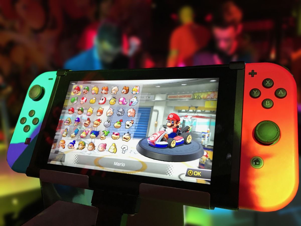 Handheld gaming device in play